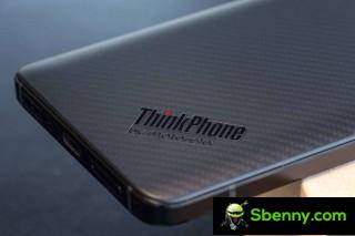 There is a customized ThinkPhone logo and a red key